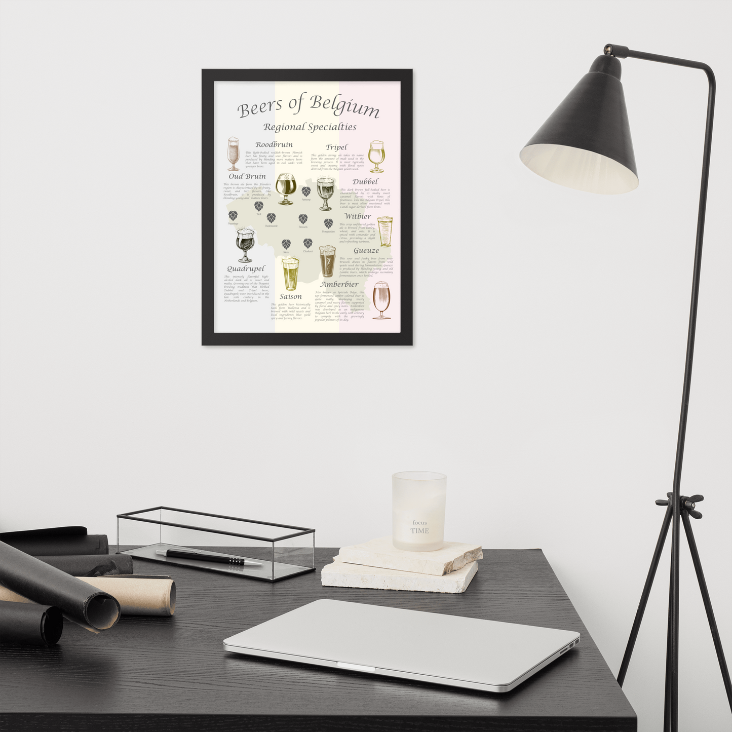 Belgian beer map art print in a black wooden frame hanging above a desk.