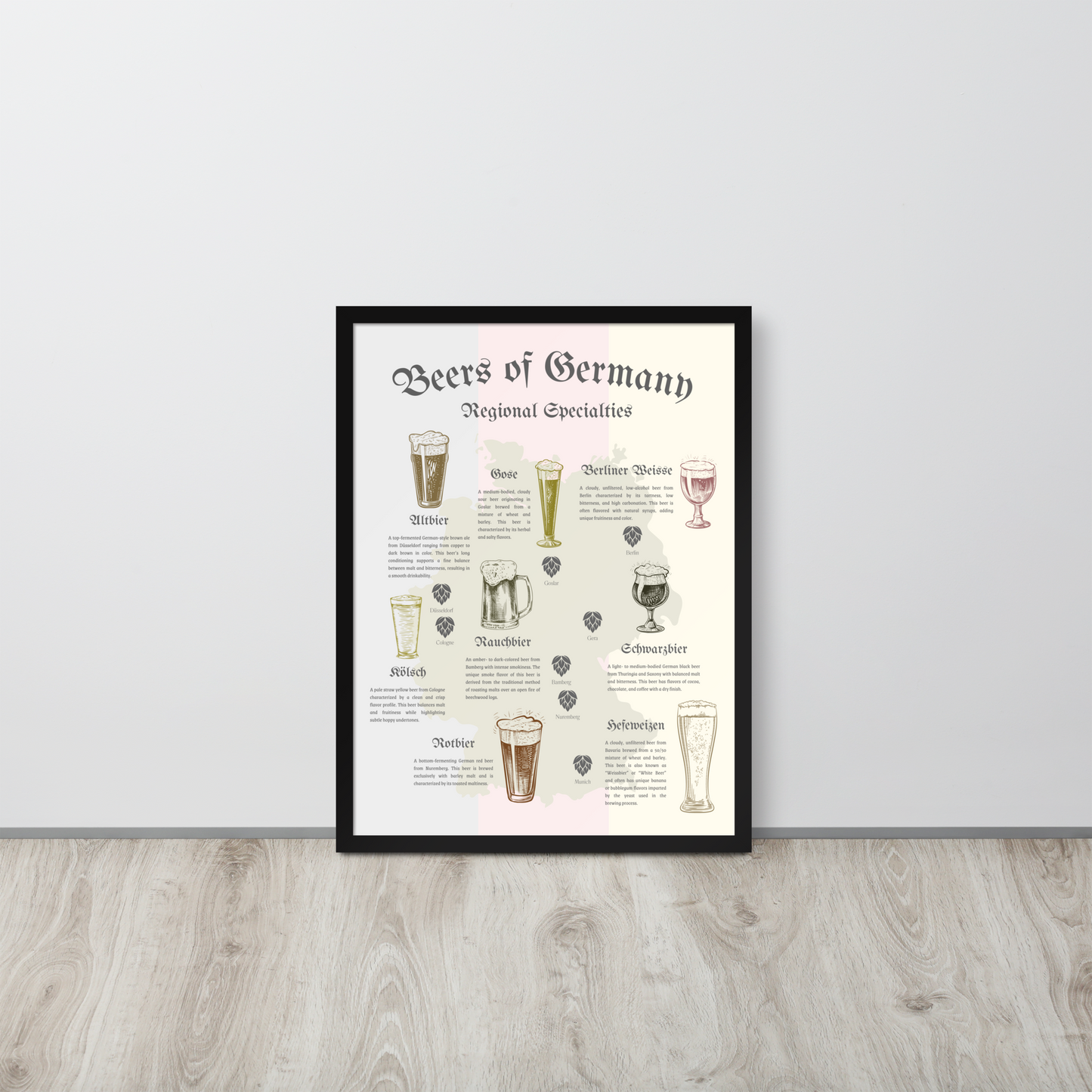 German beer map art print in a black wooden frame resting on the ground against the wall.