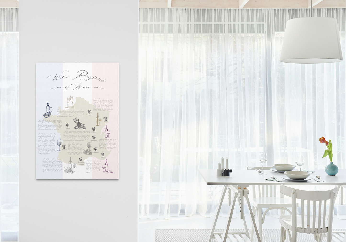 French wine map art print hanging on the wall beside a modern dining room.